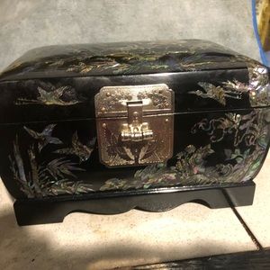 A unique black and shellia jewelry box